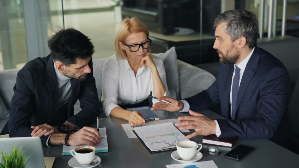 Business owners reviewing local marketing strategy